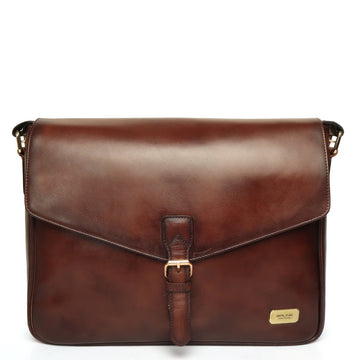 Brown laptop messenger bag with flap opening and push buckle lock by Brune & Bareskin