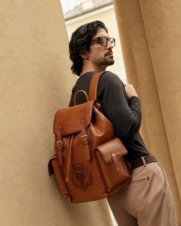Rugsack Tan Textured Leather Backpack with Buckle Strap Flap Closure