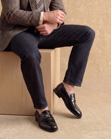 Brand Lion Logo Penny Loafers in Black Leather