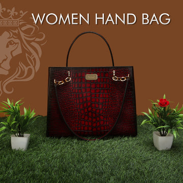 Medium Sized Leather Hand Bag In Deep Cut Smokey Wine With Embossed Lion Logo