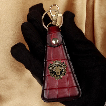 Wine Triangular Key-chain With Belt Loop with Metal Lion in Deep Cut Leather By Brune & Bareskin