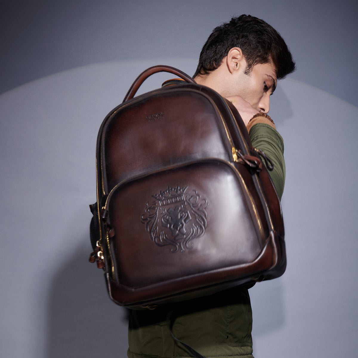 Dark Brown Leather Backpack With Embossed Lion