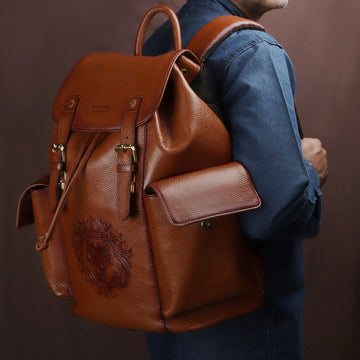 Rugsack Tan Textured Leather Backpack with Buckle Strap Flap Closure