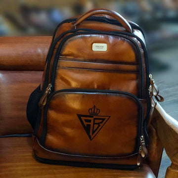 Customised Backpack of Tan Leather with Hand painted RB Initials by Brune & Bareskin