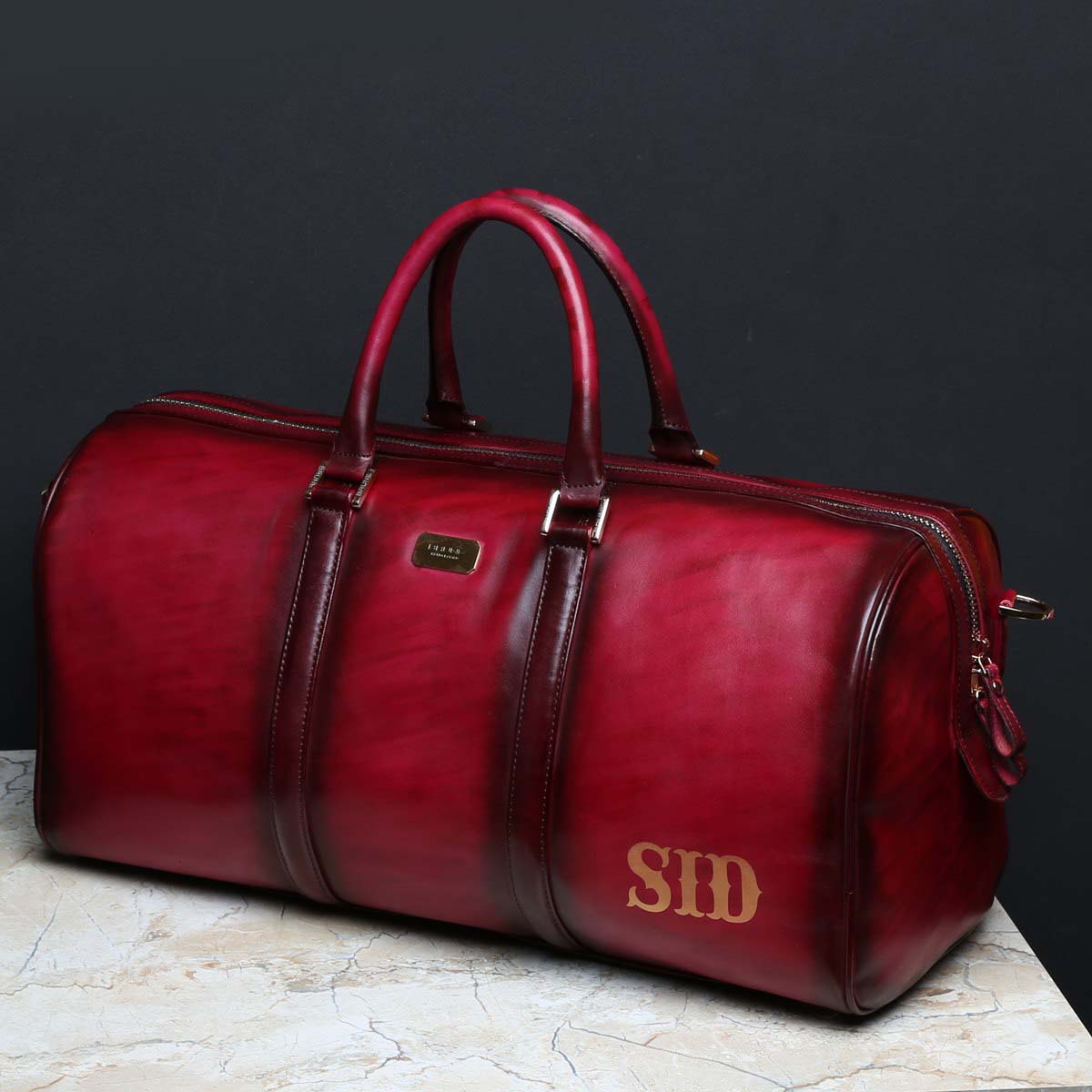 Custom-made Cherry Leather Duffle Bag with Name Initials SID by Brune & Bareskin