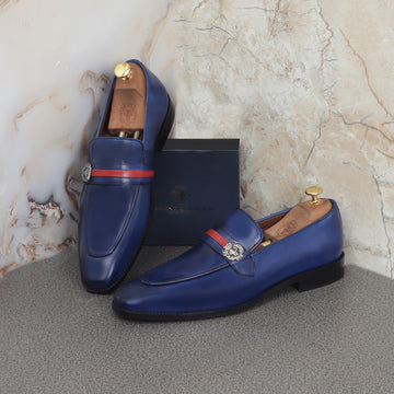 Blue Leather Slip-On with Lion Badge & Contrasting Red/Blue Strap