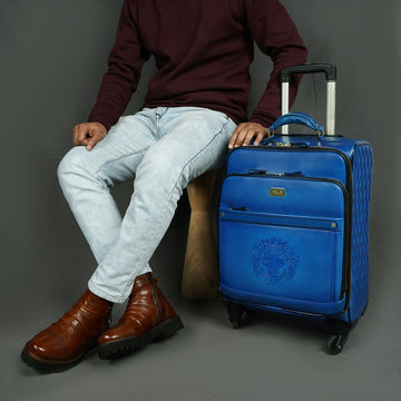 Sky Blue Leather Diamond Stitched Quad Wheel Trolley Bag With Embossed Lion Logo By Brune & Bareskin